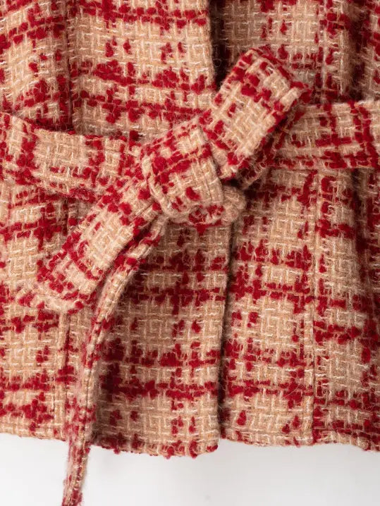 Macro close-up of self-tie belt knot and tweed fabric
