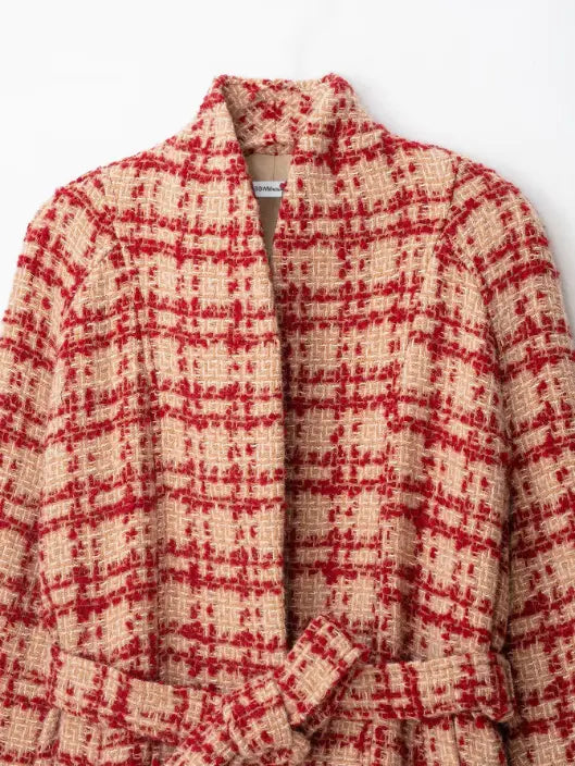 Close-up of stand collar and open front tweed