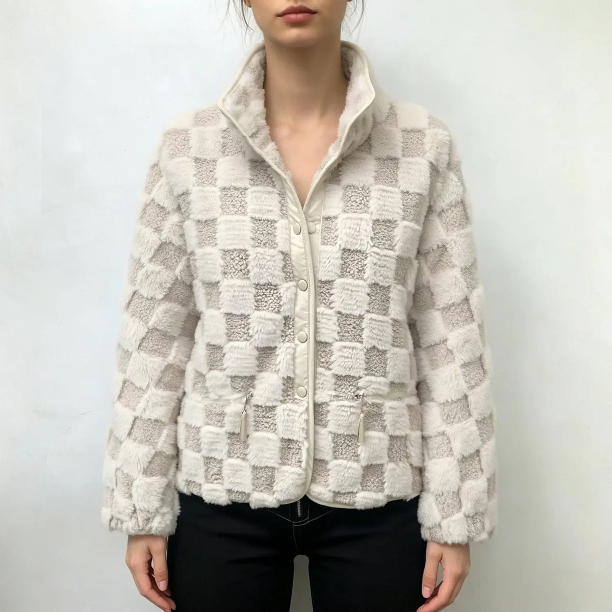 Female model wearing beige white checkered fuzzy faux fur jacket, front full view, casual winter outfit