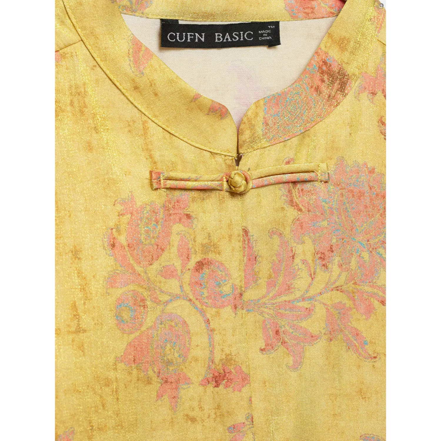 Close-up mandarin stand collar & handmade frog knot button on vintage floral silk shirt