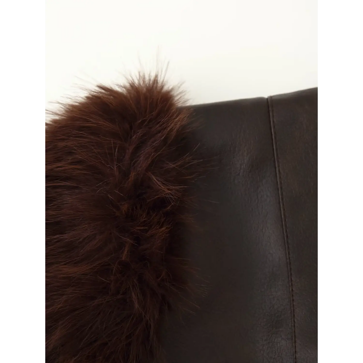 Close-up of shoulder fur panel and shell seam