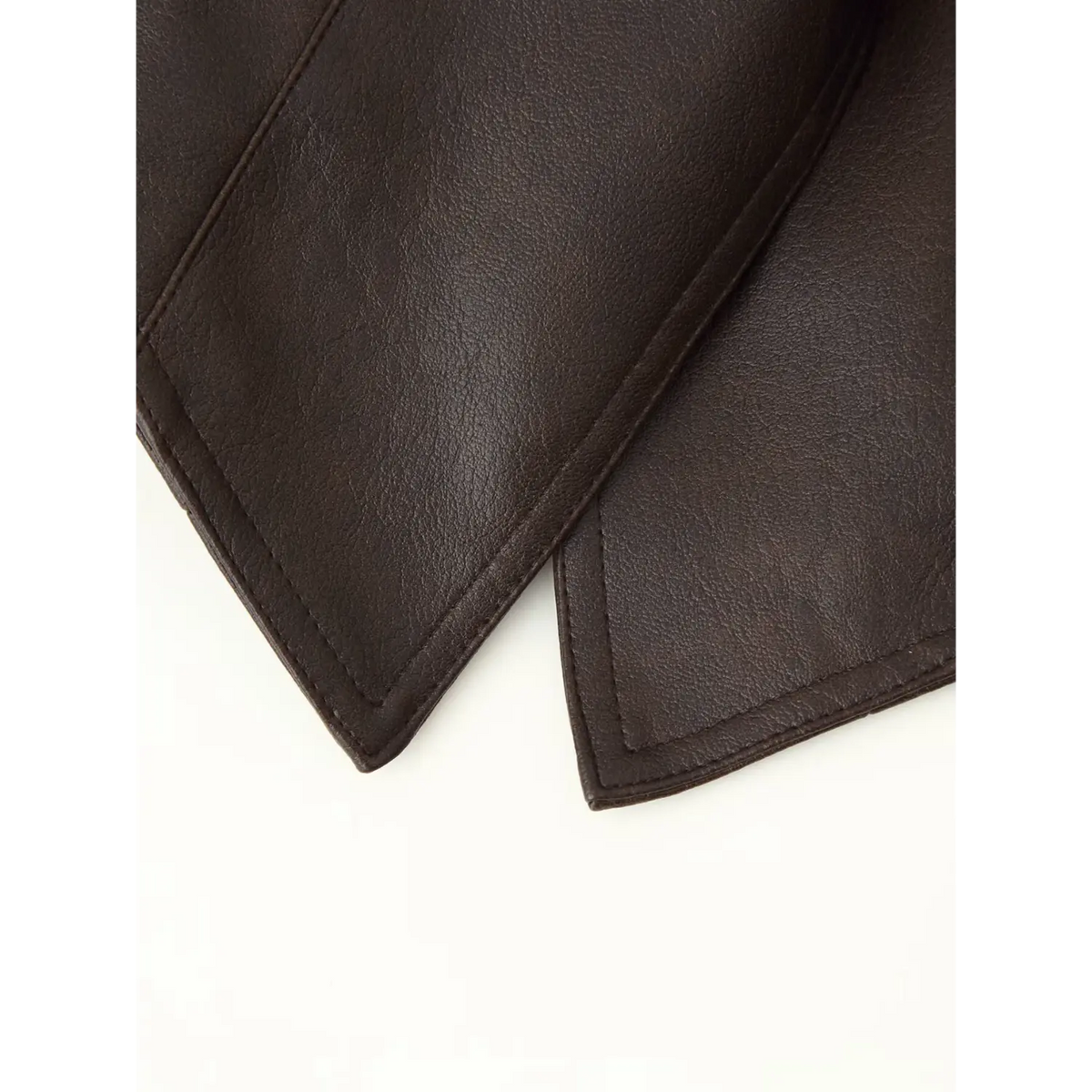Close-up of pointed hem stitching