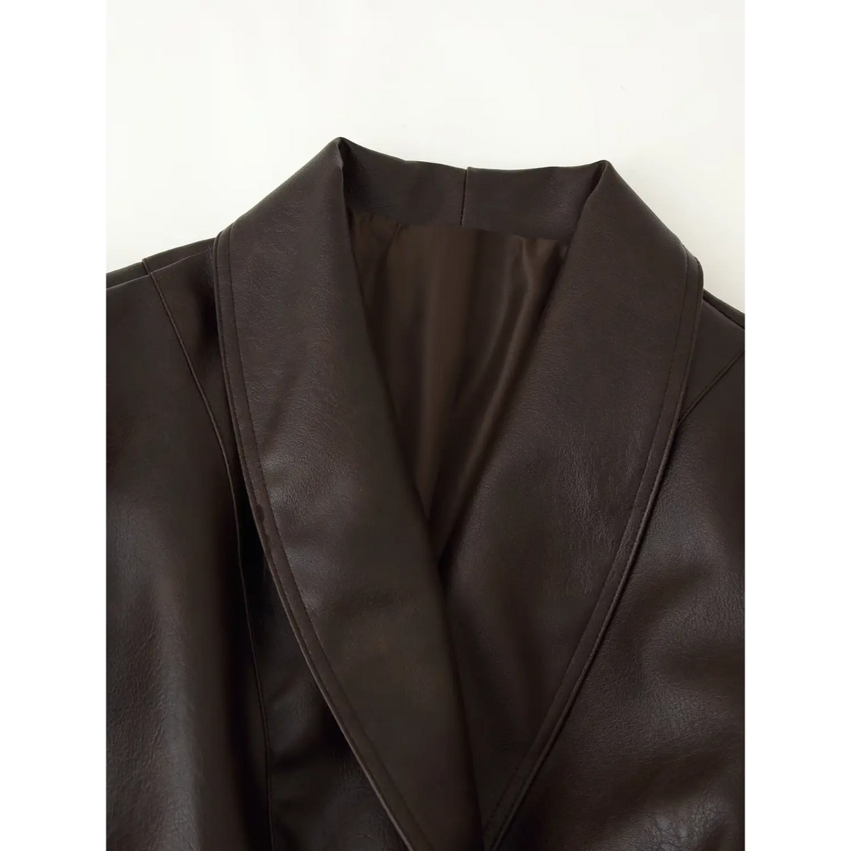 Close-up of shawl lapel and inner lining