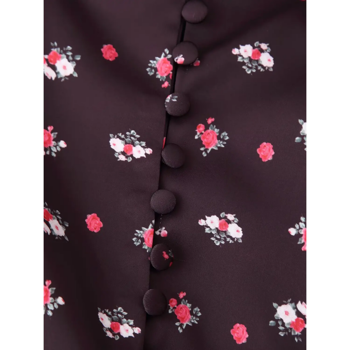 Macro close‑up fabric covered faux buttons on coffee floral maxi dress