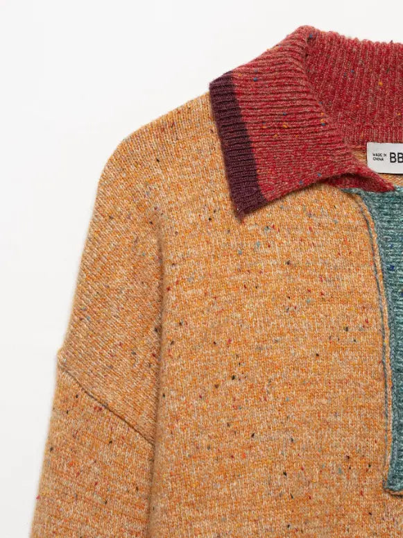 Close-up of shoulder and contrast collar