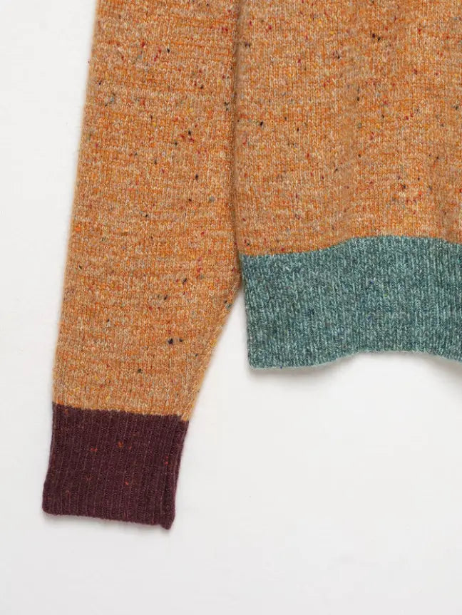 Close-up of sleeve, hem and cuff