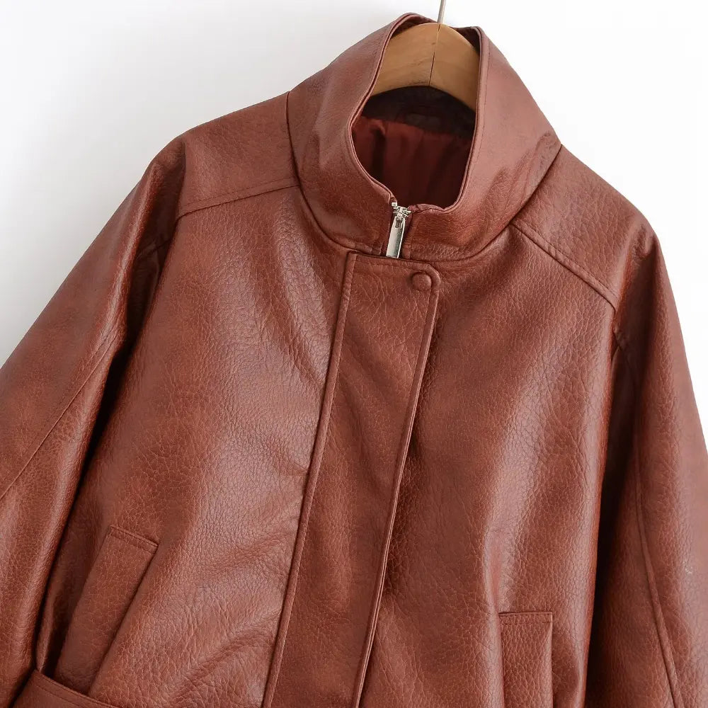 Close-up of stand collar, zip and snap button