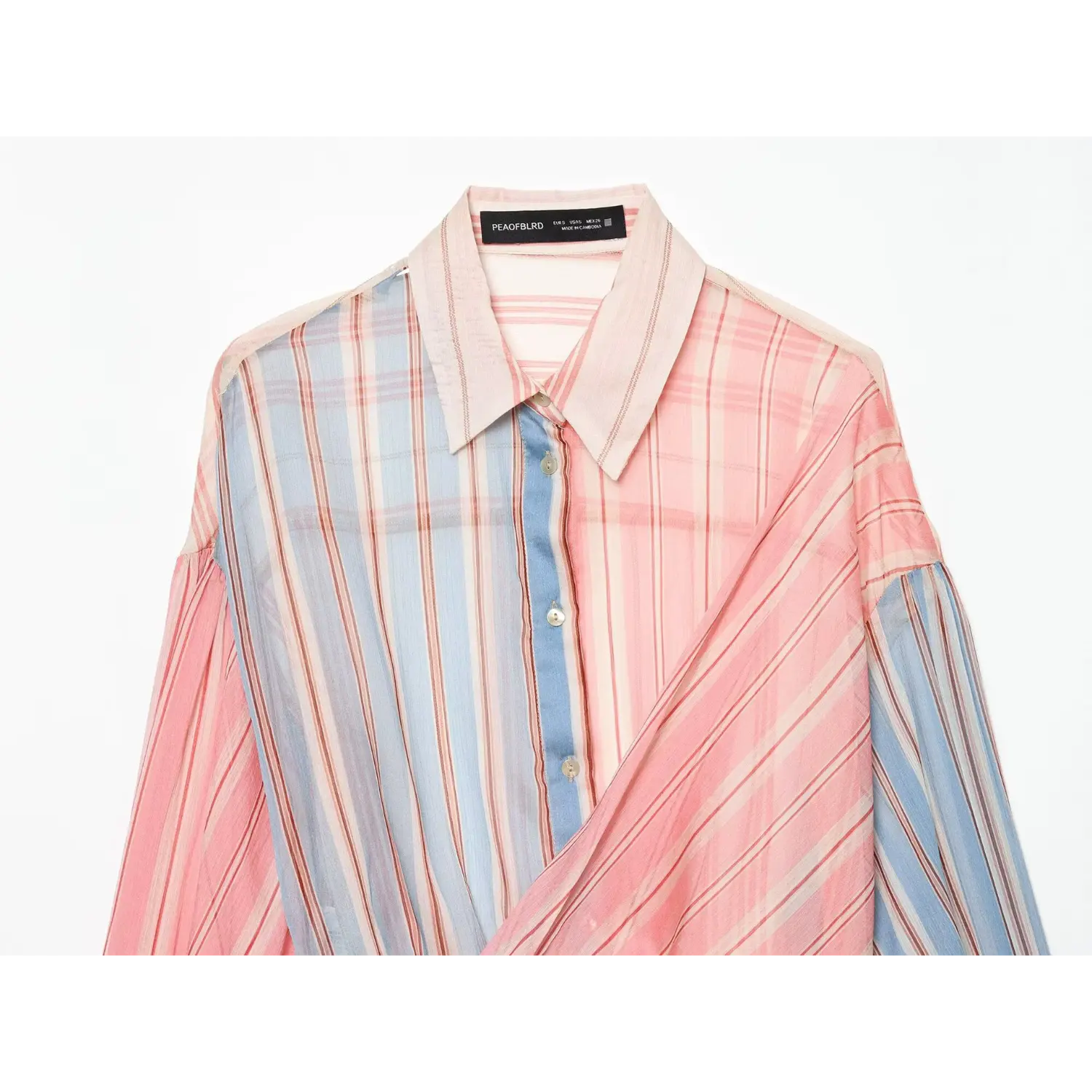 Neck partial close-up, pointed lapel collar, vertical blue stripe button placket, round shell buttons, sheer crinkle fabric