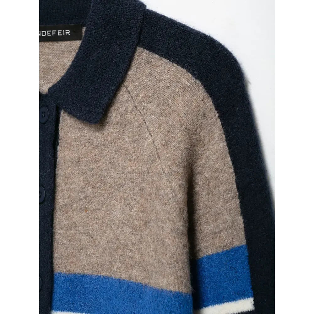 Close-up of fuzzy knit texture and raglan seam