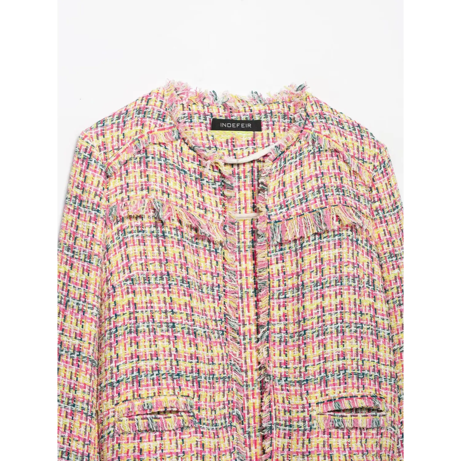 Detail shot round neck, fringe trim and pocket of colorful tweed cropped jacket