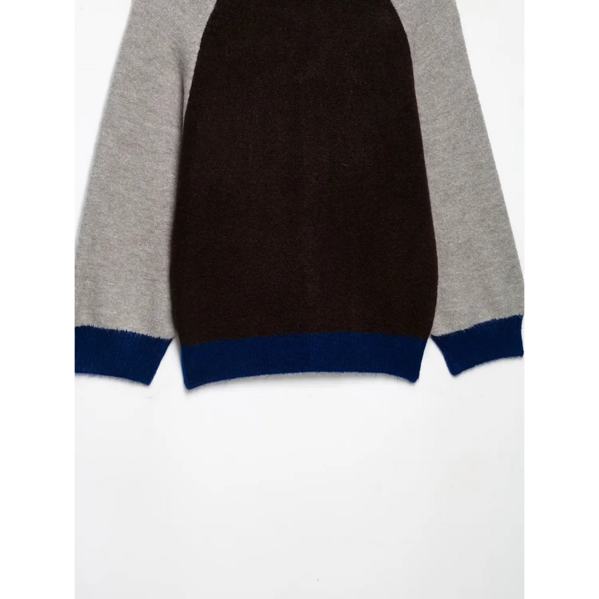 Back flat lay of sweater hem