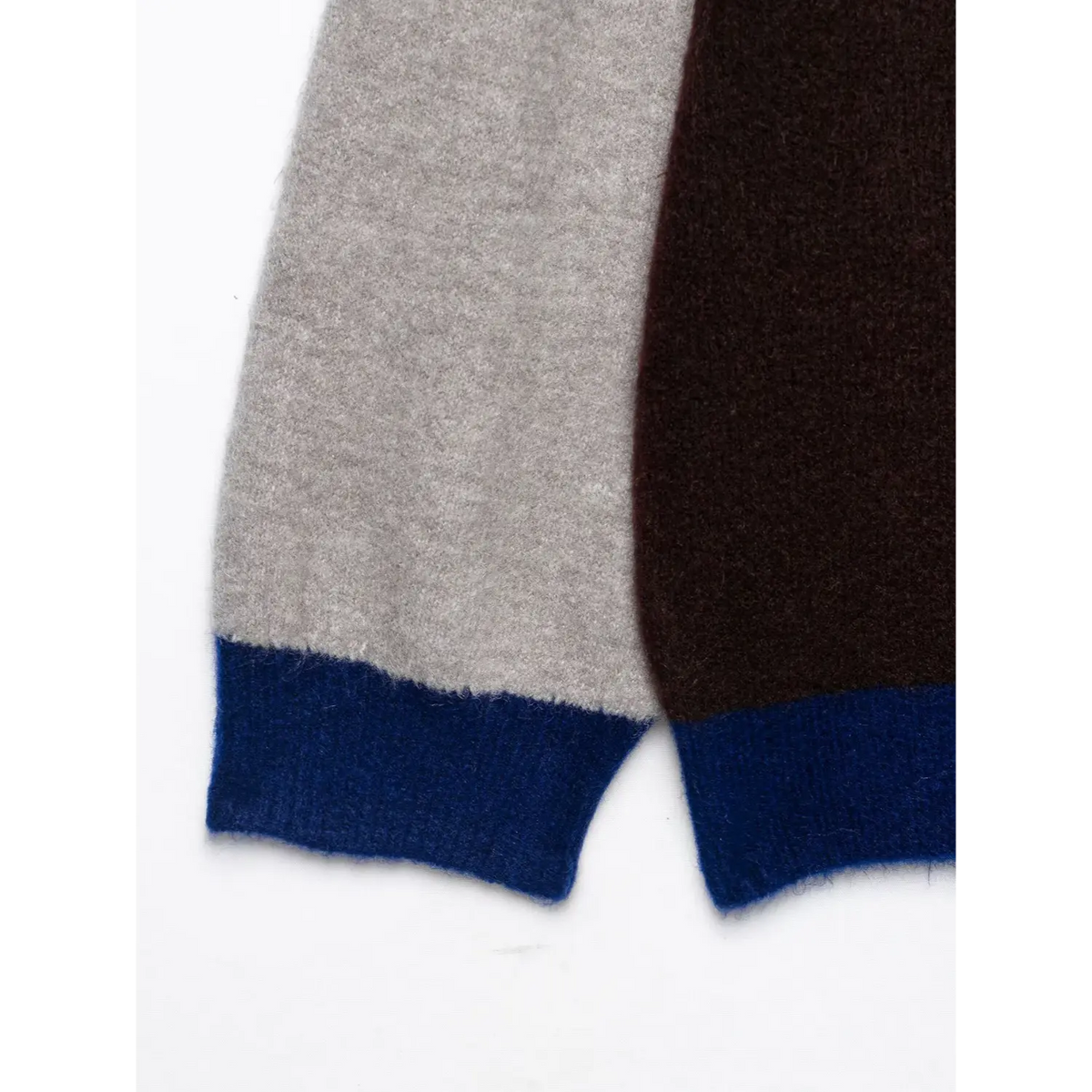 Close-up of contrast blue ribbed cuff