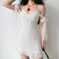 Coquette white eyelet embroidered mini dress model wear shot, V bust shirring long arm tie bows irregular ruffle hem slimming resort date outfit display