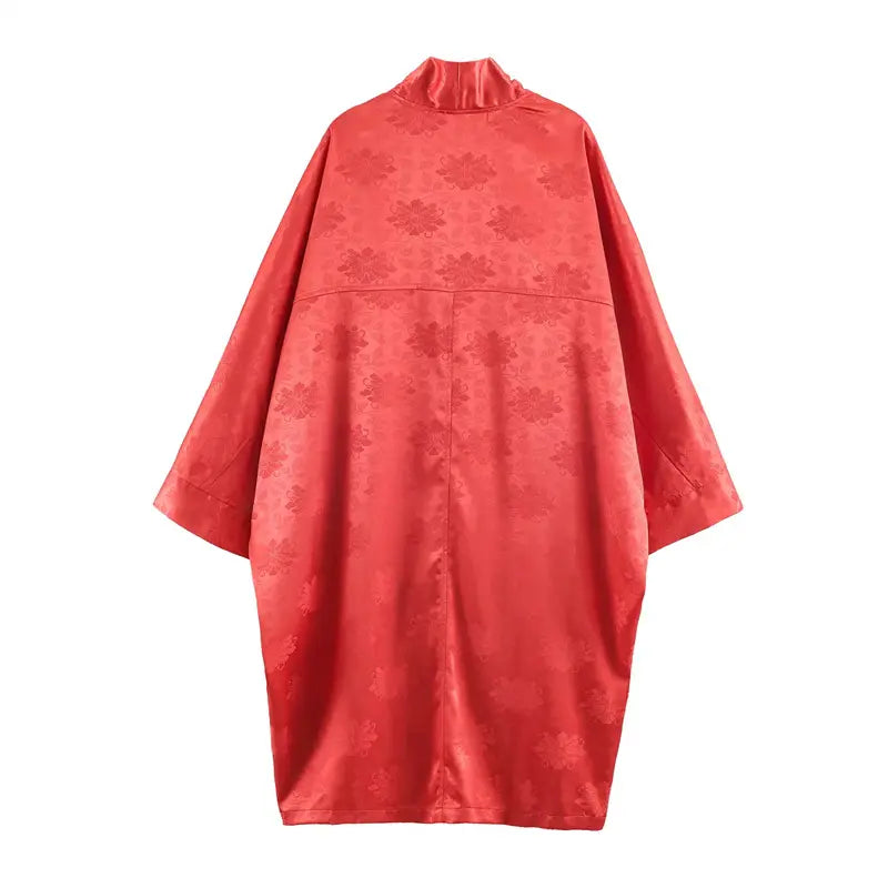 Back flat lay coral red jacquard long kimono jacket, stand mandarin back collar, horizontal back yoke stitching, full matching jacquard lining, relaxed drape silhouette