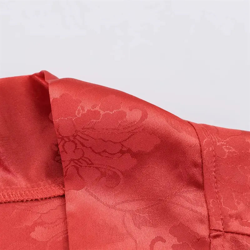 Front open draped fabric closeup, soft shiny satin jacquard with allover peony floral pattern