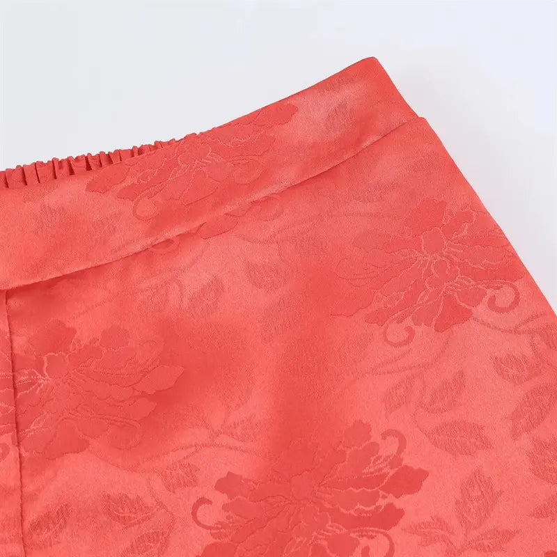 Front waist jacquard satin macro shot, subtle allover peony floral embossed woven texture