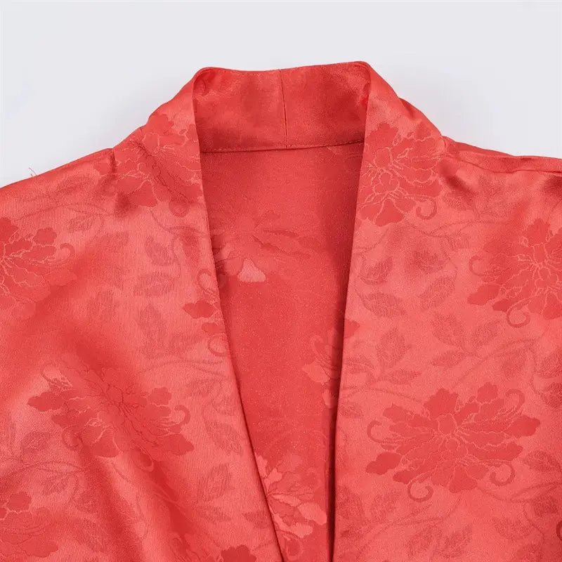 Closeup cross wrap V neck stand collar, glossy peony jacquard woven fabric, neat inner seam stitching