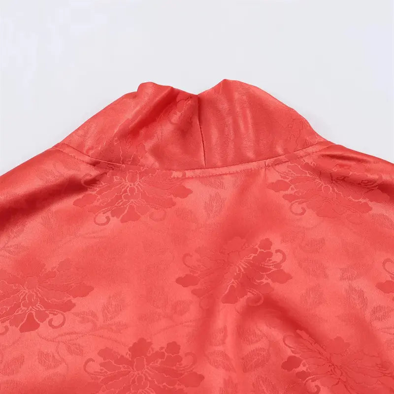 Upper back mandarin stand collar macro shot, allover subtle peony embossed jacquard woven texture