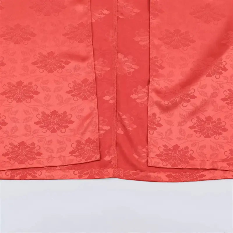 Front opening interior lining closeup, fully lined matching coral red peony jacquard satin