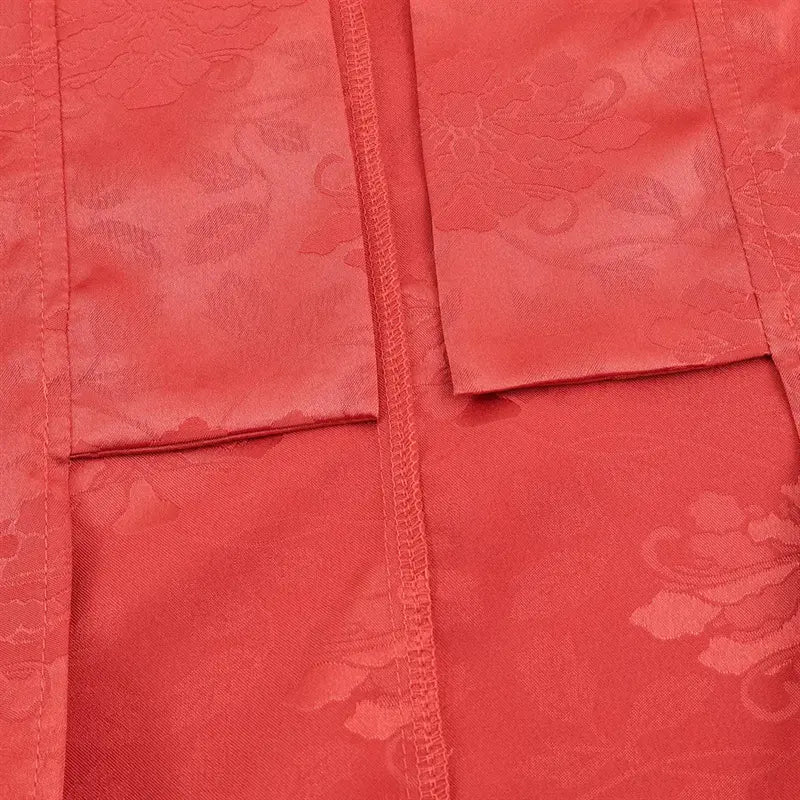 Wide kimono sleeve cuff closeup, finished folded hem edge, uniform jacquard print fabric