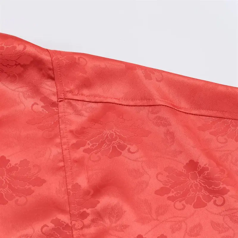 Shoulder horizontal yoke stitching closeup, oversized relaxed shoulder drape, lightweight jacquard satin material
