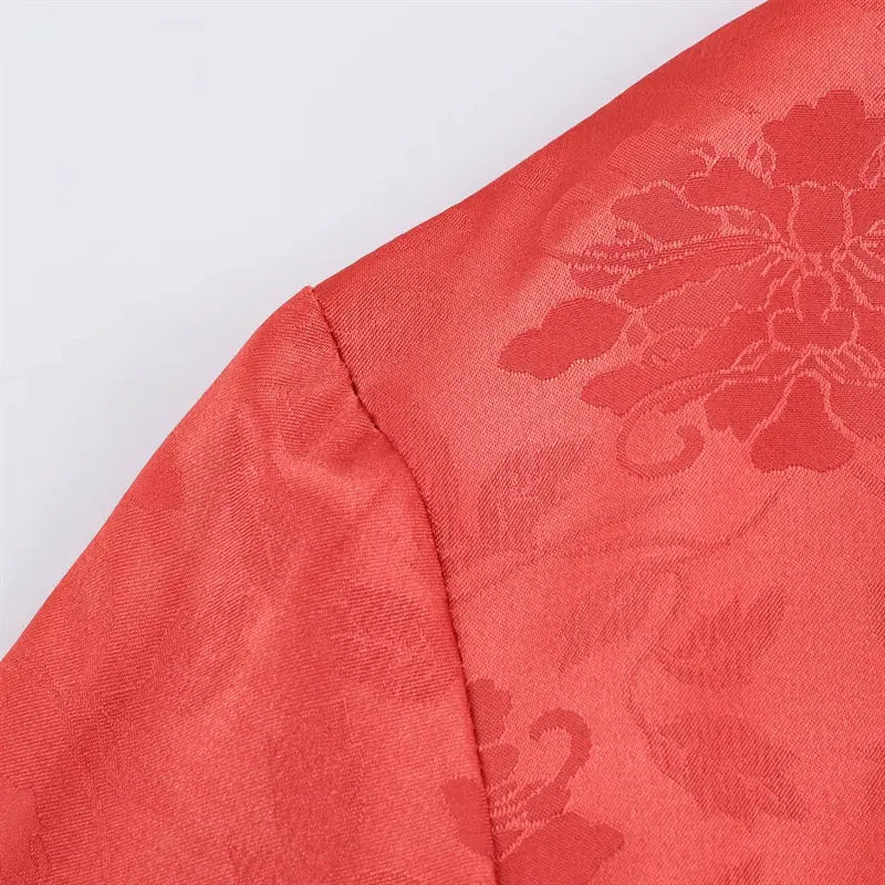 Wide raglan shoulder diagonal stitching closeup, oversized relaxed shoulder silhouette, jacquard material texture