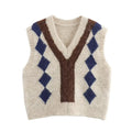 Cream fuzzy knit vest front full view, v-neck, brown Y panel and navy blue argyle diamond pattern