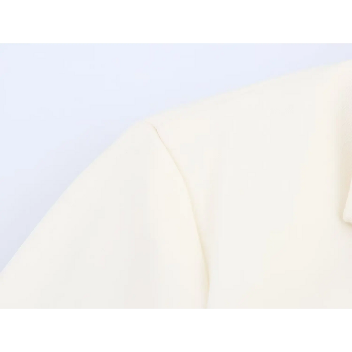 Close-up of shoulder seam stitching
