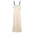 Front full flat lay cream satin maxi slip dress, double thin adjustable spaghetti straps, V neck trimmed with black contrast piping, solid plain front without keyhole cutout, slim mermaid floor-length skirt, glossy lightweight wrinkle-resistant satin fabric