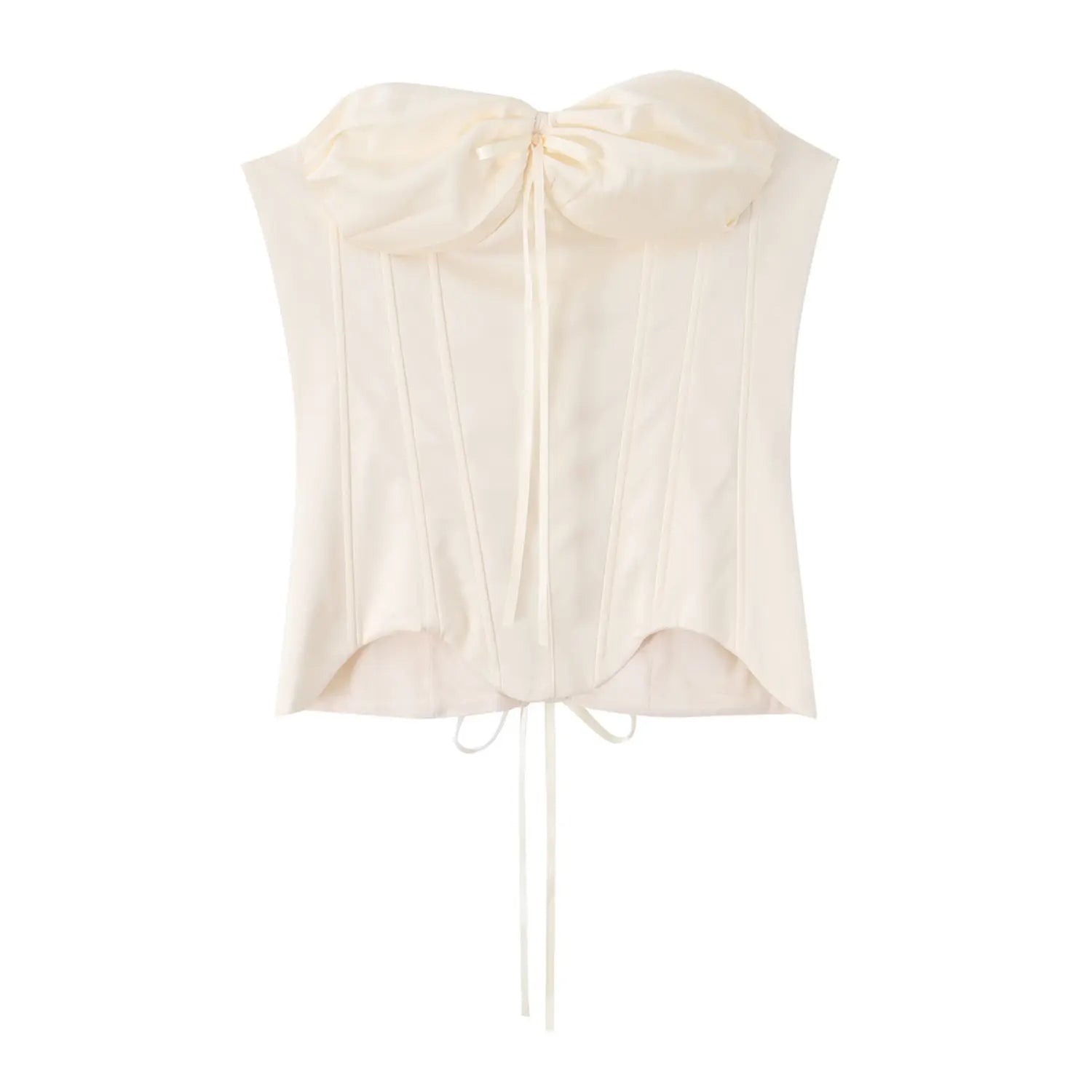 Flat‑lay front view of cream strapless corset top with large front bow, boned seams, curved scalloped hem