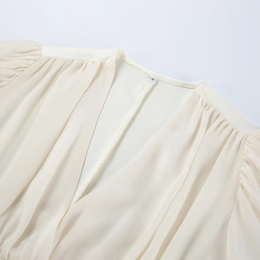 Close-up of V neck and back zipper