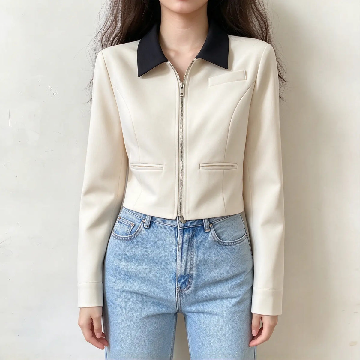 Model wearing cream contrast collar zip front cropped jacket, front view