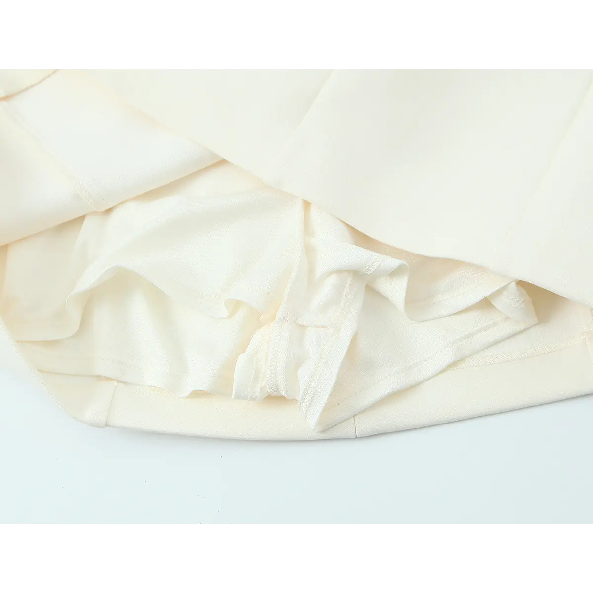 Close-up of the skirt lining, showing the attached shorts-style underlayer and clean stitching