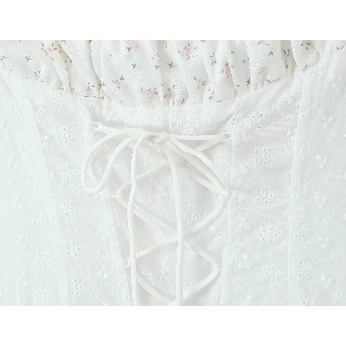 Close-up of the corset-style lace-up closure on the back bodice.