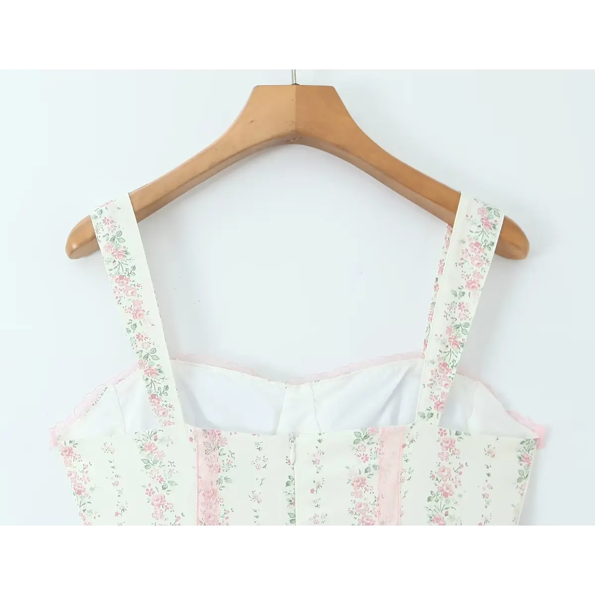 Close-up of the back view, showing the adjustable straps and hidden zipper closure.
