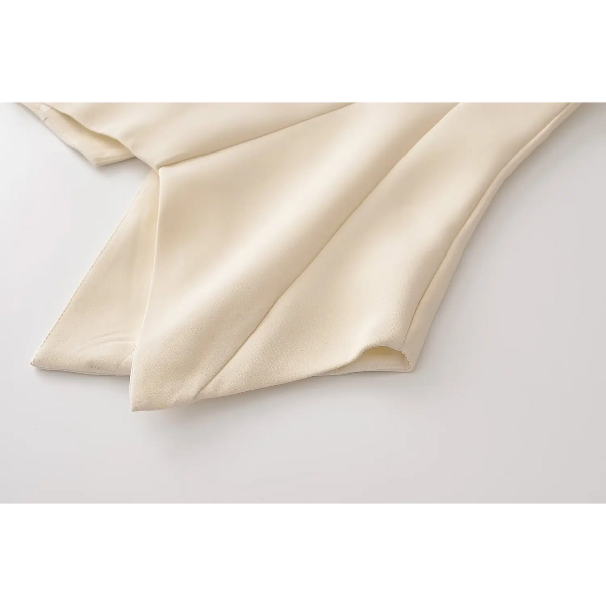 Close-up of back pointed hem detail