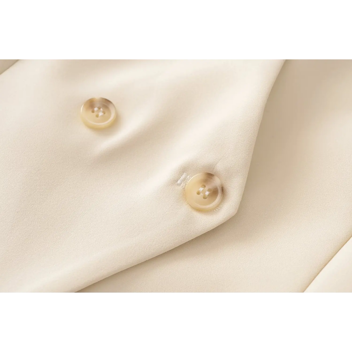 Close-up of amber tone button detail