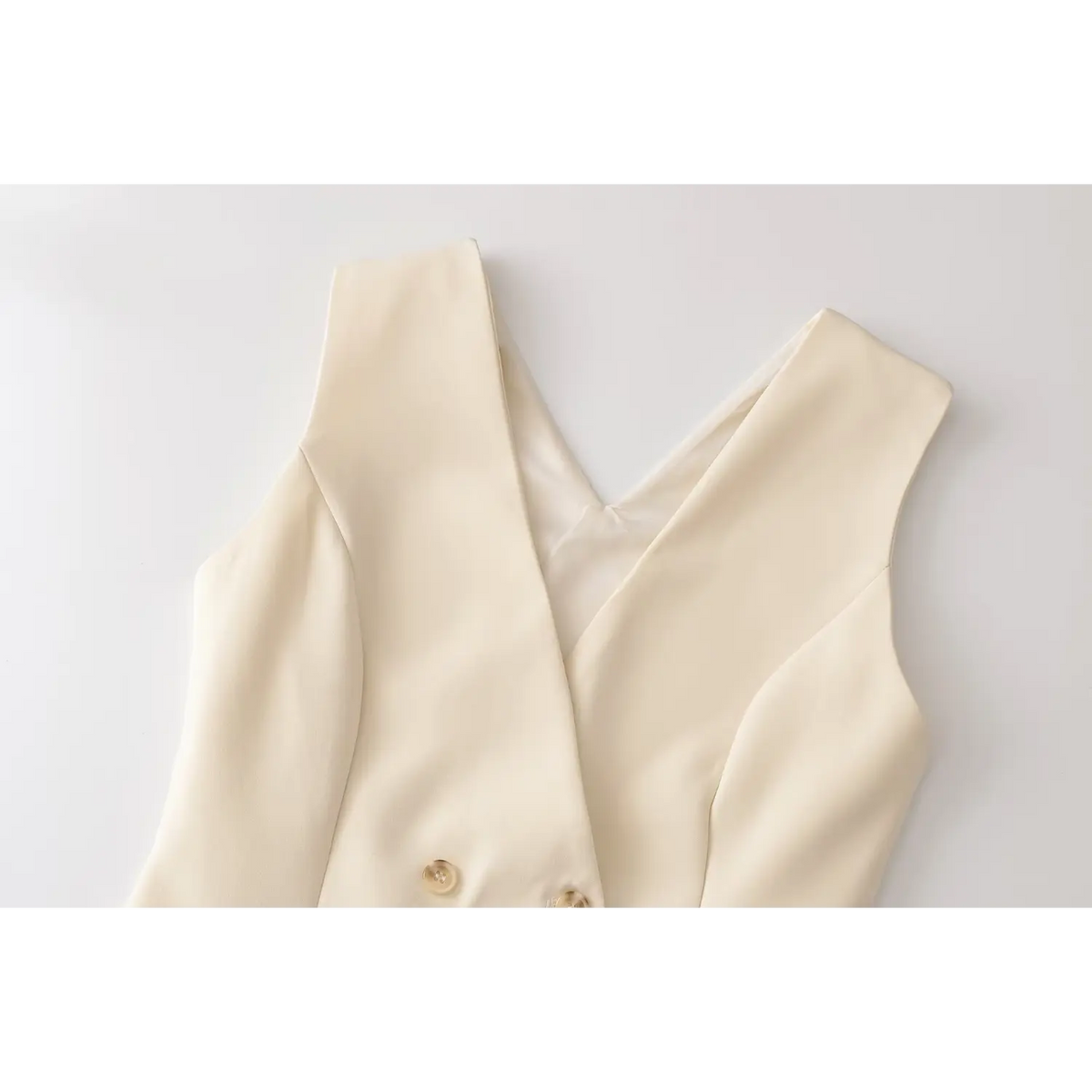 Close-up of v neckline and shoulder strap