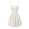 Cream floral print corset cami mini dress, tie spaghetti straps, lace trim neckline and hem, front studio shot