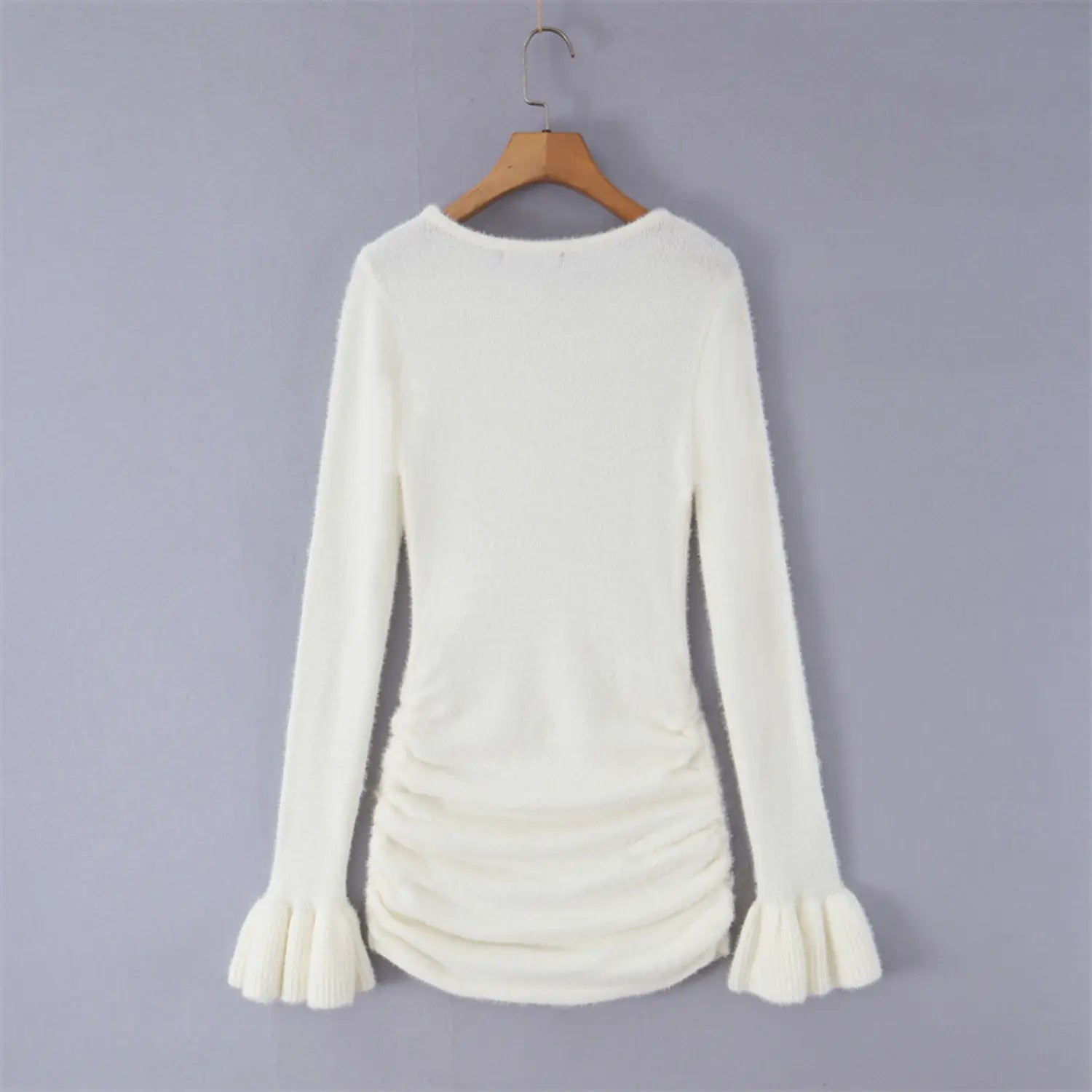 Rear hanging shot cream plush fuzzy knit long sleeve slim top, plain back waist ruched curved hem bell flared cuffs