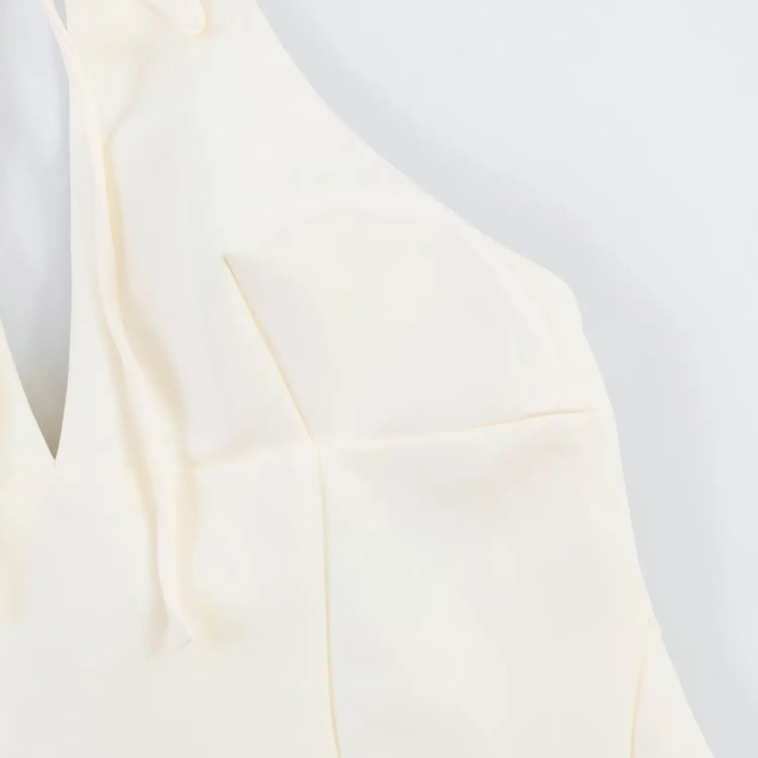 Close-up of bust contour darts and front panel stitching