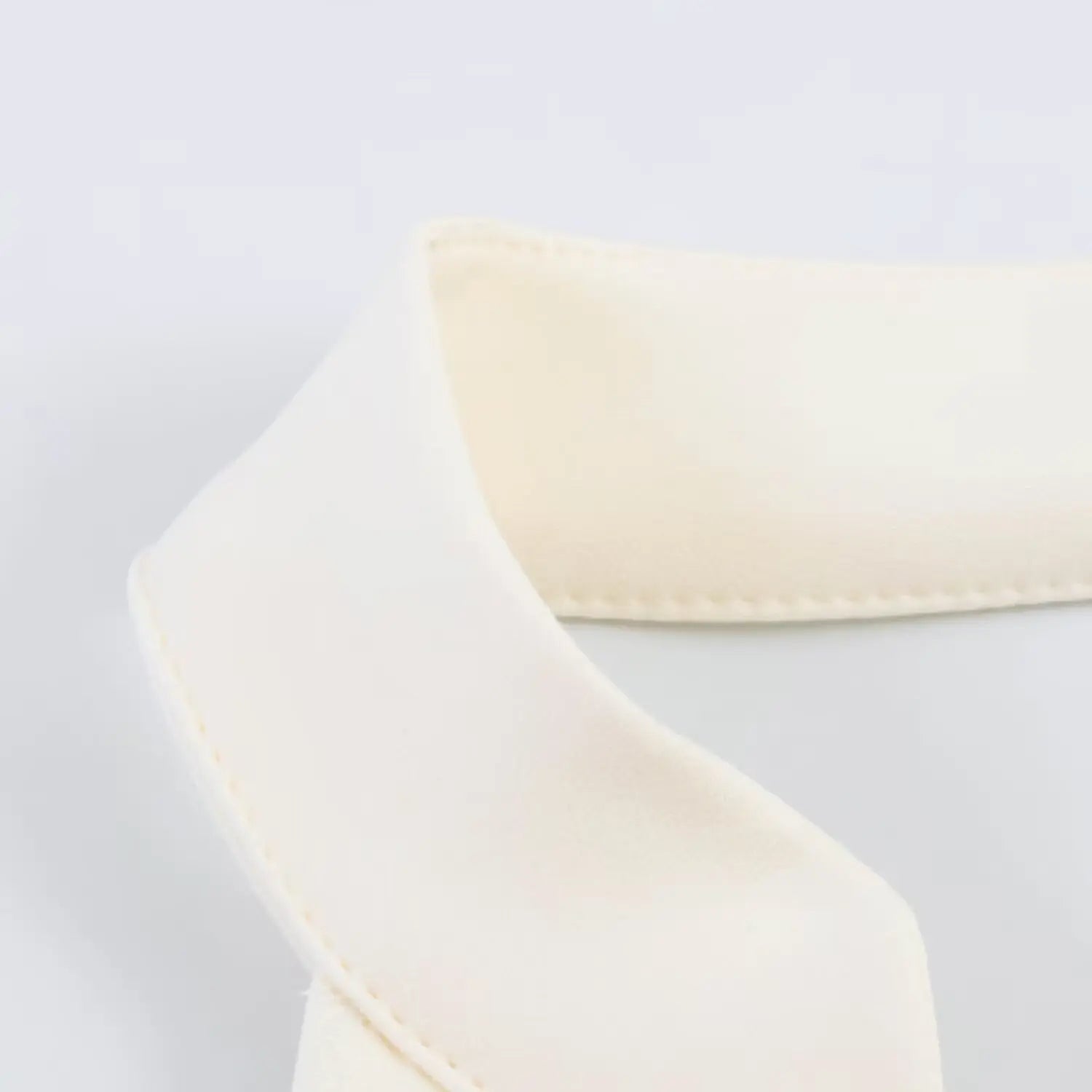 Macro shot of halter collar finished edge stitching