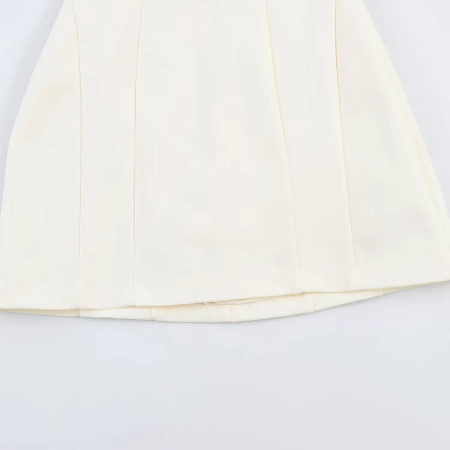Close-up of skirt vertical panel seams and finished hem