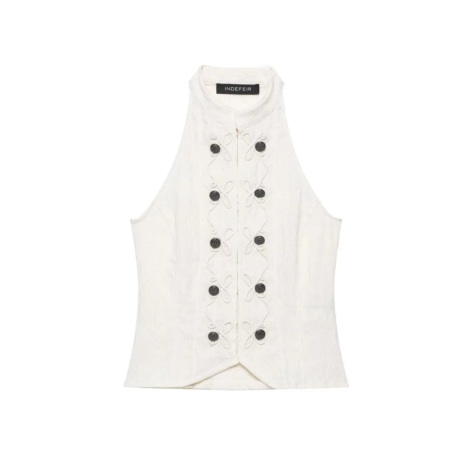 Flat lay front view cream halter sleeveless top with decorative black buttons and rope embroidery detail