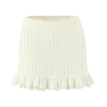 Cream lace crochet mini skirt with ruffled hem, full front view on white background