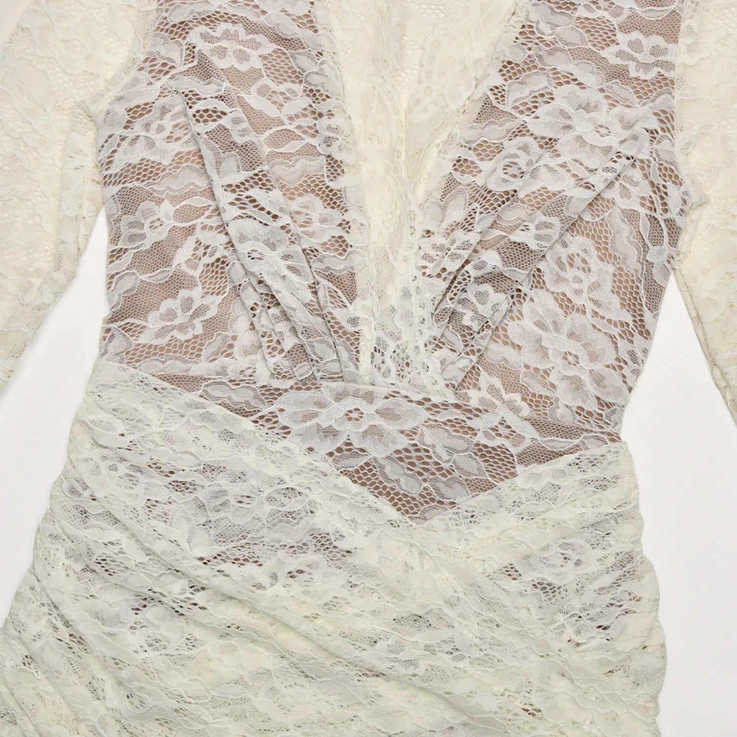 Flat lay closeup cream floral lace deep v wrap bodice detail long sleeve mini dress