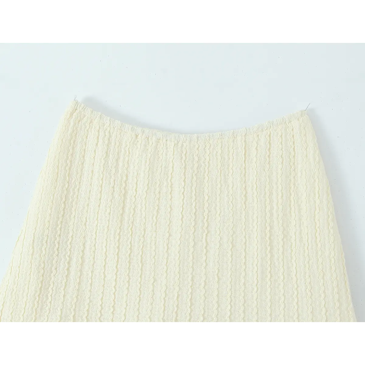 Close‑up waistband cream crochet lace mini skirt texture detail