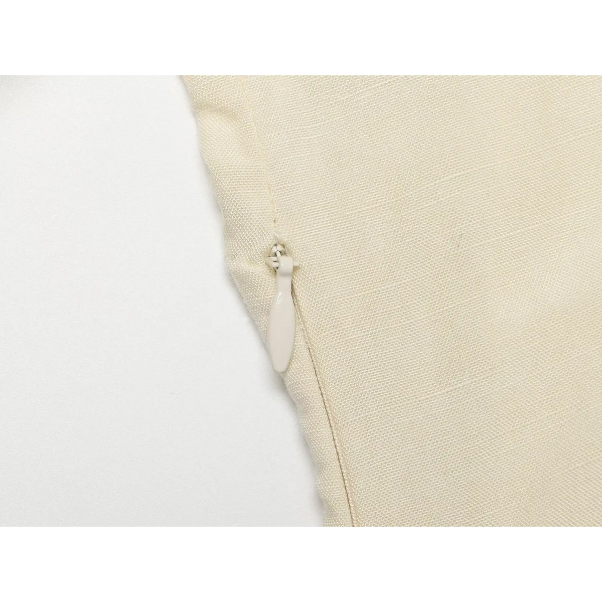 Close‑up of side invisible zipper on cream linen blend maxi dress