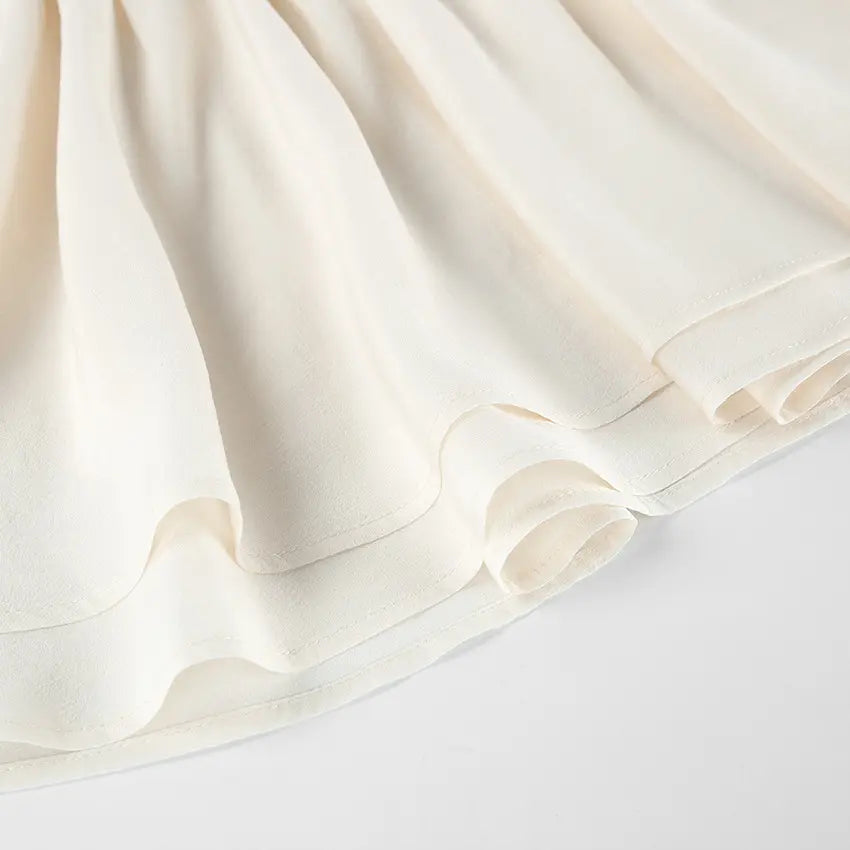 Close-up of flared chiffon skirt hem