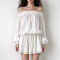 Model wearing cream off shoulder smock waist chiffon mini dress, front view